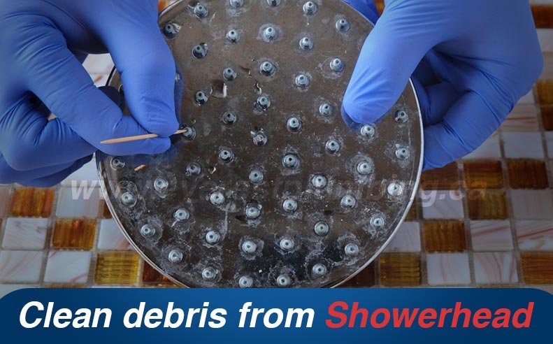third step is to clean out the debris and dirt from shower head