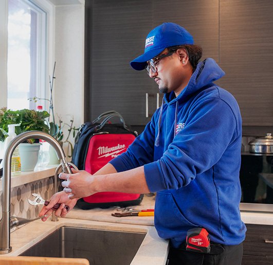 Photo of plumber technician at everest plumbing