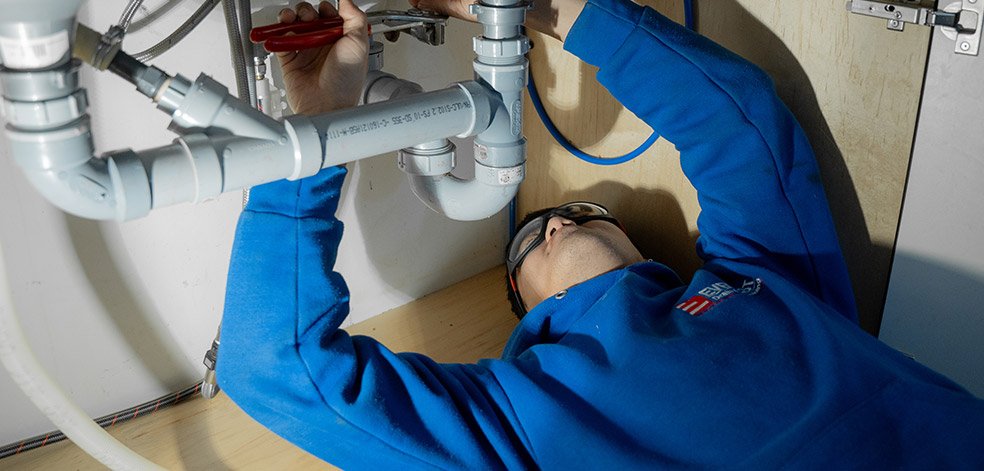 cleaning and clearing the P-trap manually for odur leakage 
