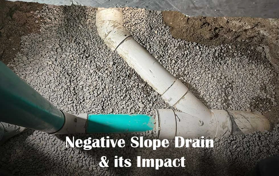 Negative Slope Drain - a white pipe with blue handle